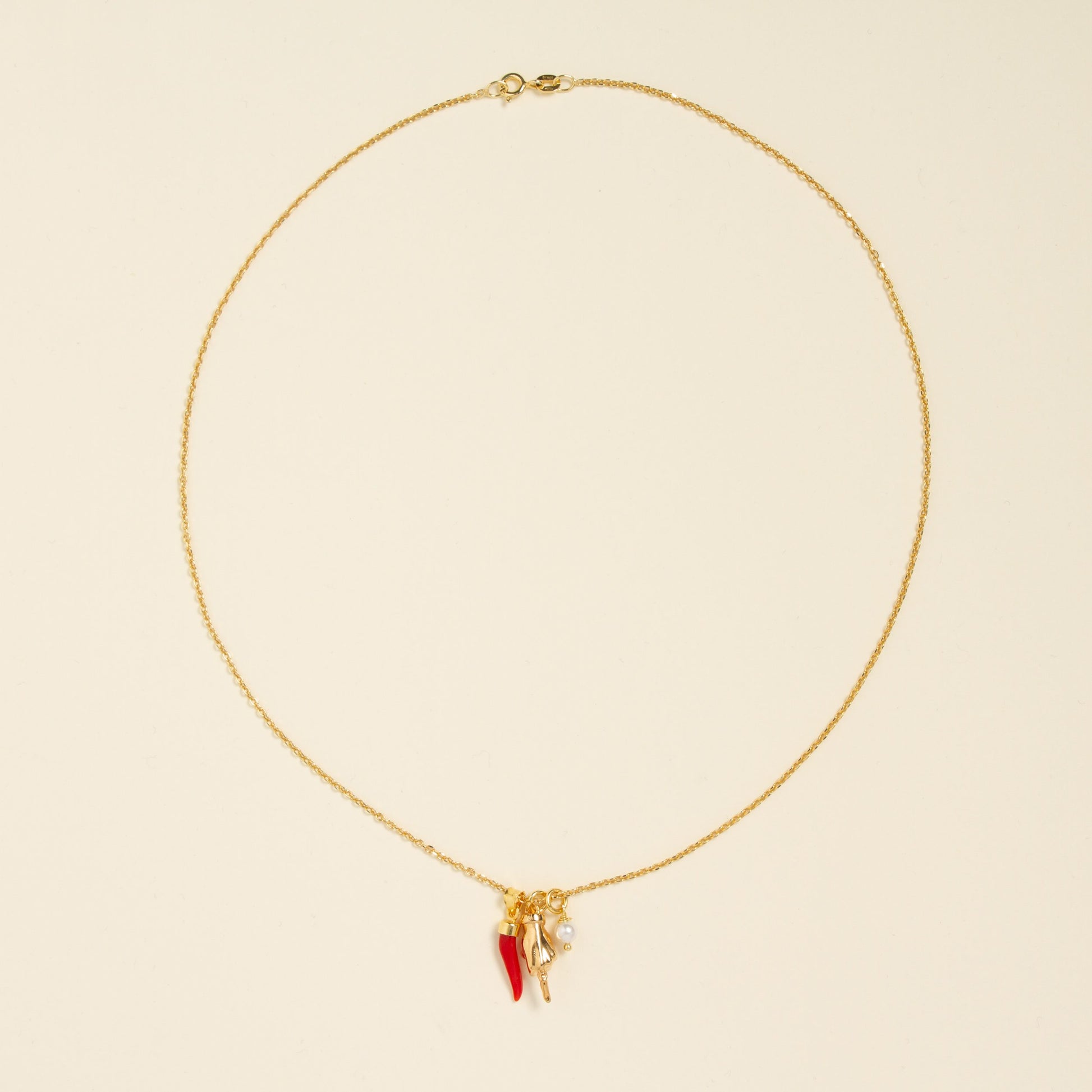 Collana Girocollo Corno in corallo e manine