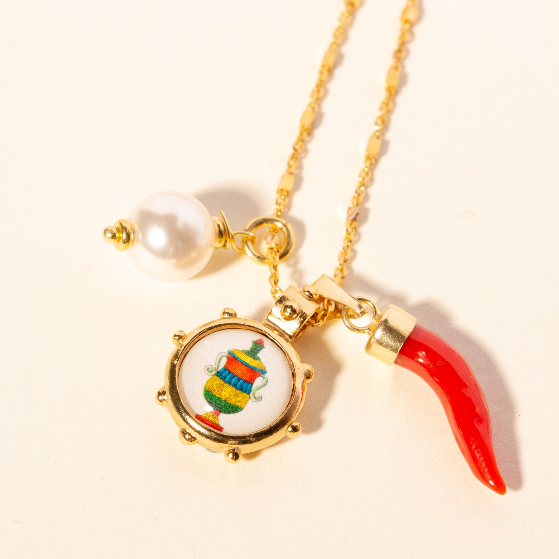 Collana Asso Coppe e corno corallo